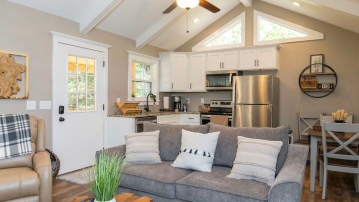 Cozy small home living room with open kitchen layout