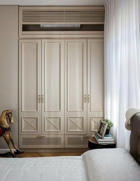 Built in bedroom wardrobe with hidden air conditioning unit
